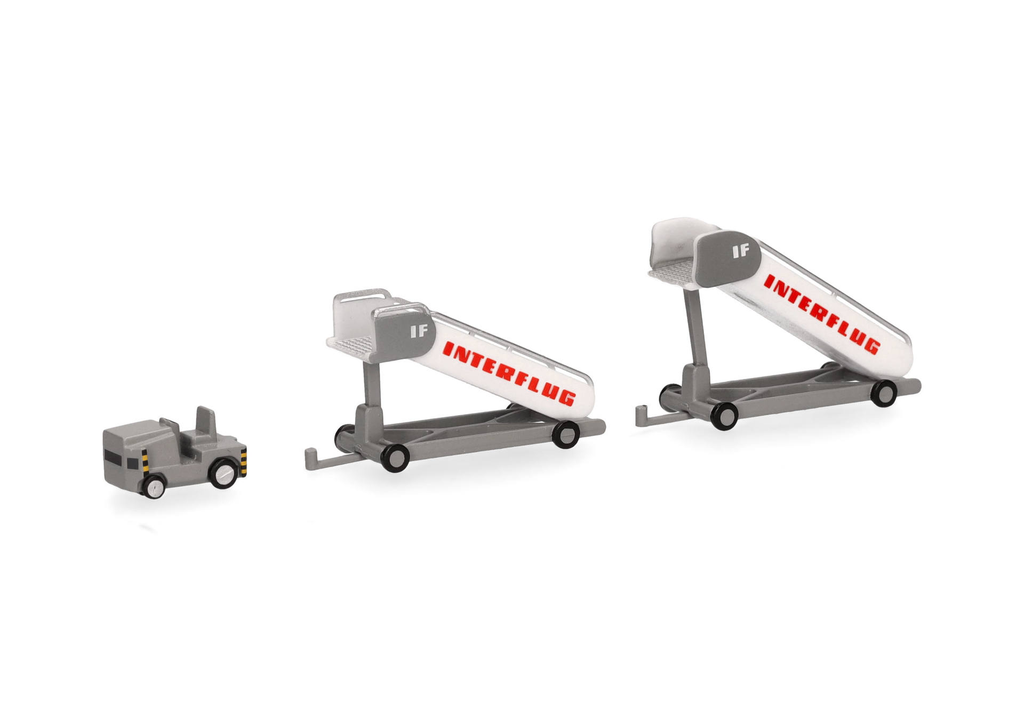 Herpa : Interflug historische Fluggasttreppen (2x) mit Zugfahrzeug (1x) [1/200]