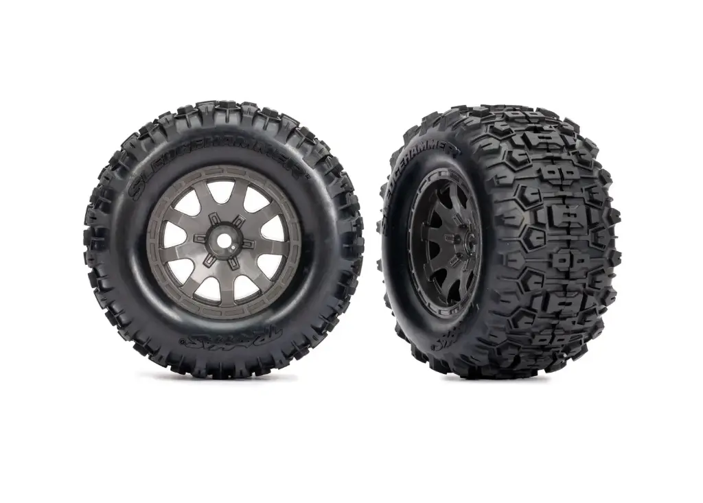 [TAX 10771-GRAY] Traxxas :  Tires & wheels, assembled (charcoal gray wheels, dual profile (2.1" outer, 2.6" inner), Sledgehammer tires, foam inserts)) (front) (2)