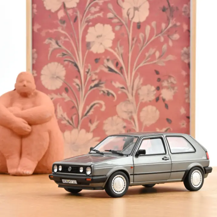 Norev : Volkswagen Golf Champion │ 1990 - Gris métallisé 1/18  [1/18]