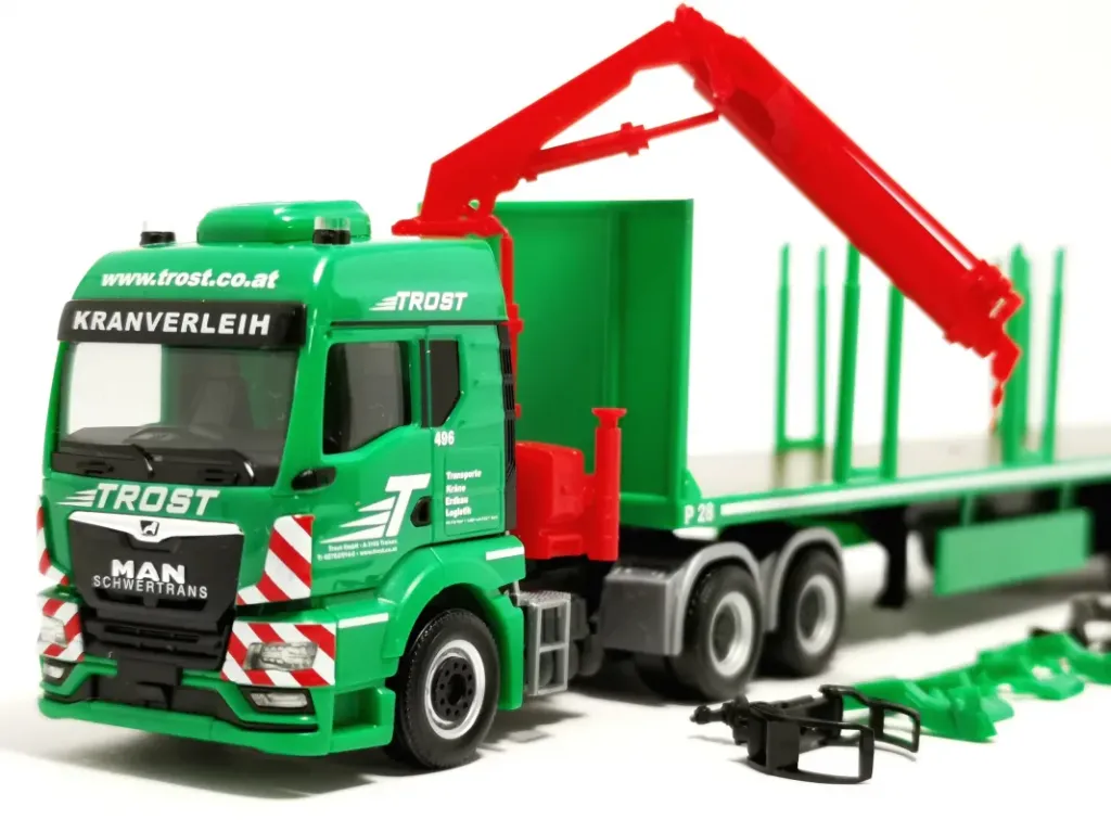 [HER 320368] Herpa : Man TGS avec grue transport de Bois 'trost' 1/87